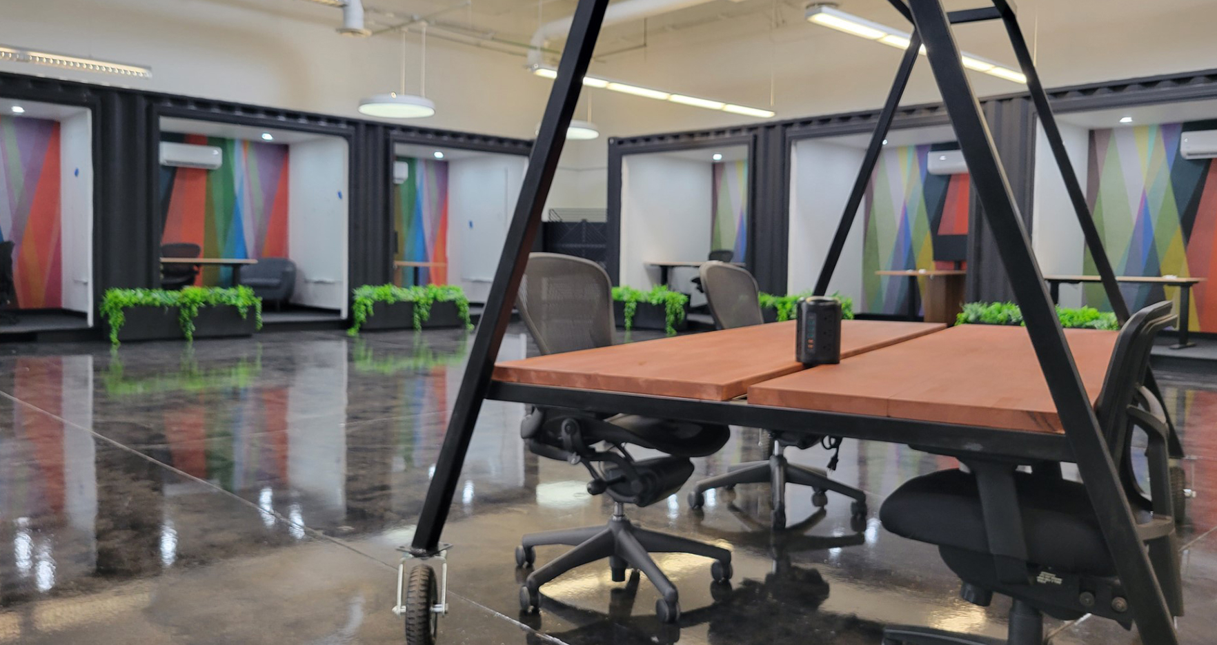 Shared coworking space in Tempe with open seating and lounge area